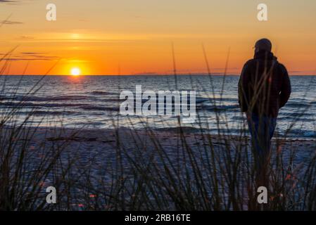 Sunrise on the beach of Thiessow, Baltic Sea, Island Rügen, Mecklenburg-Western Pomerania, Germany Stock Photo