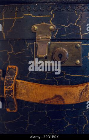 Closure of old leather suitcase, close-up Stock Photo