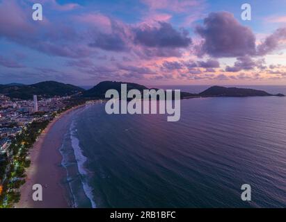 Aerial view of a building in Patong city at twilight. scene romantic pink sky on sunset at Patong beach. abstract nature background. Sunset with brigh Stock Photo