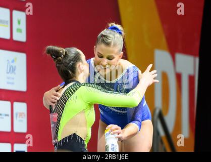 Winner Elisabeth SEITZ r. (MTV Stuttgart/ 1st place) hugs Pauline SCHAEFER-BETZ (Schafer-Betz) (KTV Chemnitz) gymnastics all-around women on July 6th, 2023 in Duesseldorf/ Germany. The finals 2023 Rhine-Ruhr from 06.07 - 09.07.2023 Stock Photo