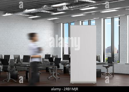 Blank roll up banner stand in white brick office interior Stock Photo