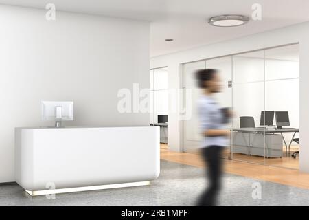 Reception desk in interior of empty business office lobby Stock Photo