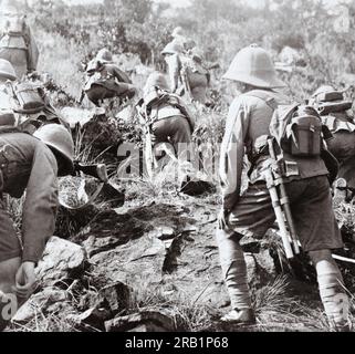 British infantry advance uphill in East Africa during the First World War. Stock Photo