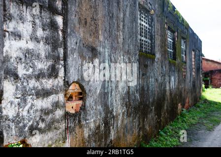 An old wall weathered and eroded by time. District of Acupe, Santo Amaro. Stock Photo
