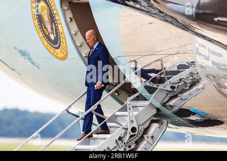 United States President Joe Biden walks off Air Force One after