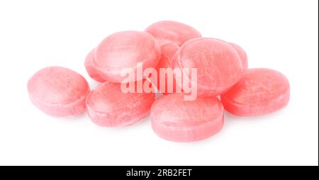 Many pink cough drops on white background Stock Photo