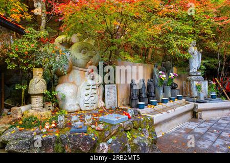 Fukuoka, Japan - Nov 21 2022: Nanzoin Temple in Fukuoka is home to a huge statue of the Reclining Buddha (Nehanzo) which claims to be the largest bron Stock Photo