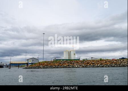 HOMER, AK, USA – JUNE 3, 2023: City of Homer Port & Harbor, Petro Marine Services fuel storage and dock Stock Photo