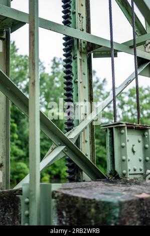 Counterweight of a lock and dam mechanical structure along the Erie Canal Trail outside of Rochester, NY Stock Photo