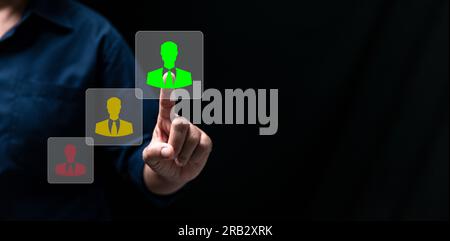 Businesswoman touching human resources sign - HR, HRM, HRD concept which is among staff icons for human development recruitment leadership and custome Stock Photo