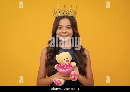 Birthday kids prom party. Girls party, funny kid in crown. Child queen wear diadem tiara. Cute little princess portrait. Happy girl face, positive and Stock Photo