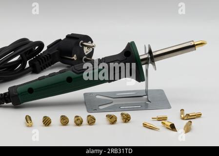 Pyrography with bit tool set isolated on white background. Stock Photo