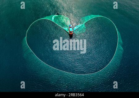 Fishermen are fishing anchovies at Hon Yen Island, Phu Yen, Vietnam Stock Photo