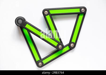 segmented anti-theft bicycle lock on white background close-up Stock Photo