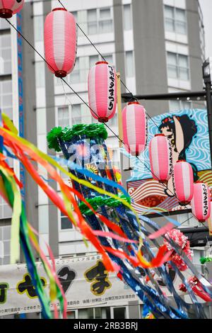 Tokyo, Japan. 7th July, 2023. Decorations to celebrate Tanabata festival are on display along Kappabashidogugai Street, the shopping street near Asakusa in Tokyo. Kappabashi-dori, also known just as Kappabashi or Kitchen Town, is a shopping street in Tokyo between Ueno and Asakusa famous for supplying the restaurant industry. The annual celebration commemorates the legend of two lovers separated by the Milky Way who only meet once a year on the seventh day of the seventh month. (Credit Image: © Rodrigo Reyes Marin/ZUMA Press Wire) EDITORIAL USAGE ONLY! Not for Commercial USAGE! Stock Photo