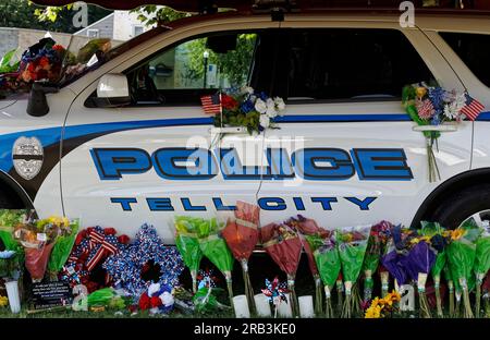 Flowers and memorial tributes are piled alongside the Dodge Durango patrol vehicle of Tell City Police Department Sgt. Heather J. Glenn on Thursday, July 6, 2023 near city hall in Tell City, Troy Township, Perry County, IN, USA. Glenn, 47, was shot and killed July 3 while trying to arrest a domestic violence suspect at a local hospital, becoming the first line-of-duty death in the Tell City Police Department's nearly 165-year history and second Indiana police officer to be killed in the line of duty in less than a week. (Apex MediaWire Photo by Billy Suratt) Stock Photo