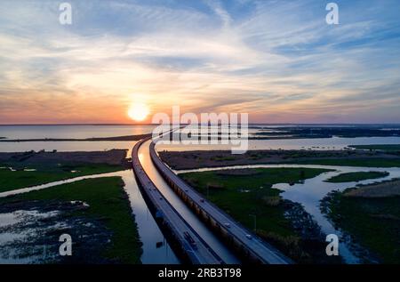 Mobile Bay and jubilee parkway bridge at sunset Stock Photo