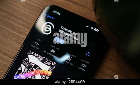 Threads app from Instagram logo on phone screen stock image Stock Photo