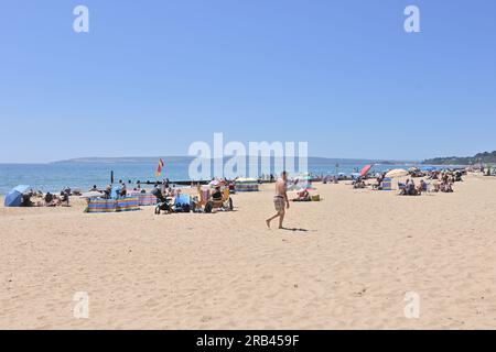 Bournemouth, Dorset, England, UK, 7th July 2023, Weather. Hot and sunny day on the south coast with people at the seafront and on the beach. Credit: Paul Biggins/Alamy Live News Stock Photo