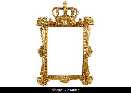 Carved gilden frame with a king crown, isolated on white background, empty copy space for text Stock Photo