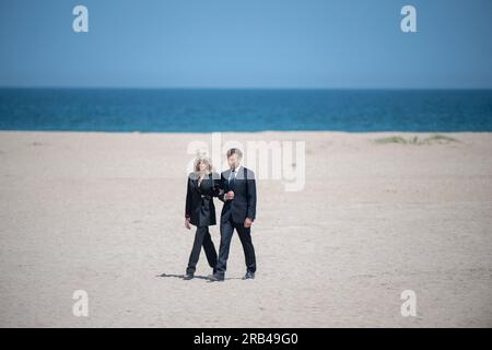 Ouistreham, France. 07th July, 2023. French President Emmanuel Macron and his wife Brigitte Macron leave following a national tribute to late Leon Gautier, French WWII veteran and the last surviving member of French Captain Philippe Kieffer's green berets commando that waded ashore on D-Day alongside Allied troops to begin the liberation of France, during a ceremony on the beach in Ouistreham, Normandy, on July 7, 2023. Photo by Eliot Blondet/ABACAPRESS.COM Credit: Abaca Press/Alamy Live News Stock Photo