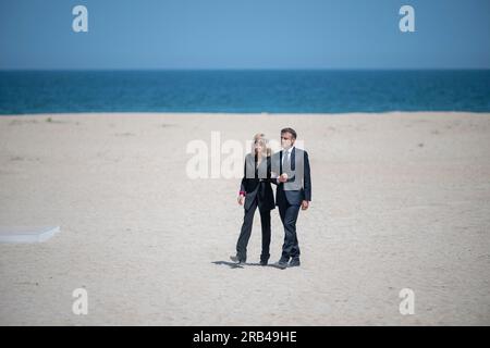 Ouistreham, France. 07th July, 2023. French President Emmanuel Macron and his wife Brigitte Macron leave following a national tribute to late Leon Gautier, French WWII veteran and the last surviving member of French Captain Philippe Kieffer's green berets commando that waded ashore on D-Day alongside Allied troops to begin the liberation of France, during a ceremony on the beach in Ouistreham, Normandy, on July 7, 2023. Photo by Eliot Blondet/ABACAPRESS.COM Credit: Abaca Press/Alamy Live News Stock Photo