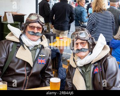 Men dressed up as World War Two fighter pilots at the 1940's weekend in Ingleton, Yorkshire Dales, UK. Stock Photo