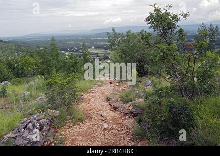 The path of descent from Mount Križevac in the midst of nature Stock Photo
