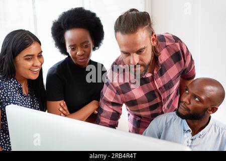 Development team reviews code, product owner, scrum master, developers in office Stock Photo