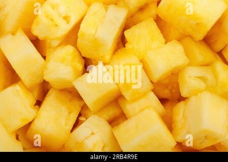 sliced pineapple cubes background pattern Stock Photo