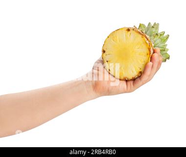 sliced pineapple in hand path isolated on white Stock Photo