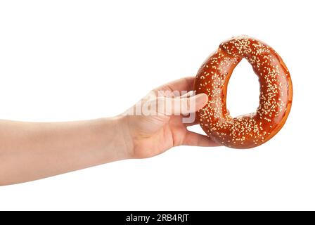 bagel in hand path isolated on white Stock Photo