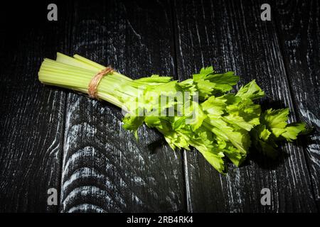 celery sticks bunch on wood background Stock Photo