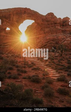 Stairs leading to Window Arch at sunset in Arches National Park, Utah, USA Stock Photo