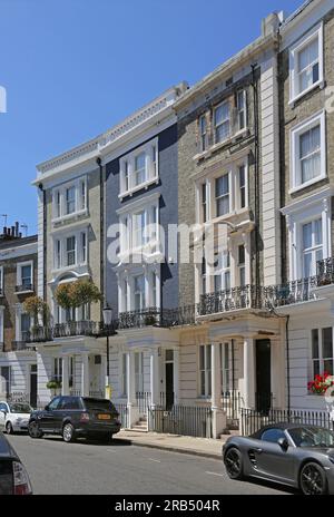 London, UK: Luxury houses in Horbury Crescent, Notting Hill Gate, one of the the wealthiest areas of London. Huge, Regency-style luxury houses. Stock Photo