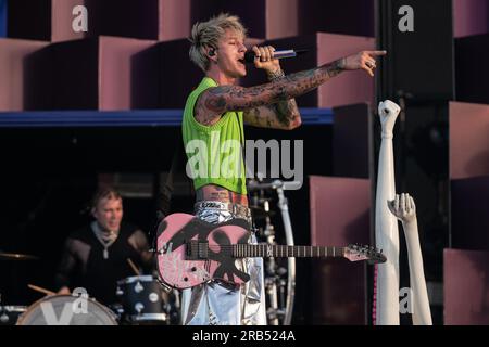 Colson Baker, artistically known as Machine Gun Kelly or simply Kells, American musician, rapper, singer and actor, seen during a performance on the first day of the Mad Cool 2023 festival, in Villaverde. Stock Photo