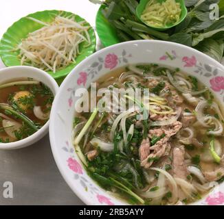 Pho is very famous food in Vietnam. The whole world knows this dish. Beef noodle Stock Photo