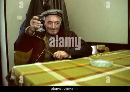 Elderly Man Drinking Red Wine Stock Photo