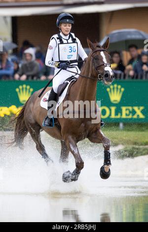 Yasmin INGHAM (GBR) on Banzai du Loir galloping, in the water, action, eventing, cross-country C1C: SAP-Cup, CCIO4*, on July 1st, 2023, World Equestrian Festival, CHIO Aachen 2023 from June 23rd to - 02.07.2023 in Aachen/Germany; Stock Photo