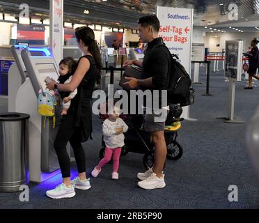 Milwaukee, Wisconsin, USA. 7th July, 2023. Early morning Southwest Airlines passengers check in at General Mitchell International Airport in Milwaukee, Wisconsin Wednesday July 5, 2023. (Credit Image: © Mark Hertzberg/ZUMA Press Wire) EDITORIAL USAGE ONLY! Not for Commercial USAGE! Stock Photo