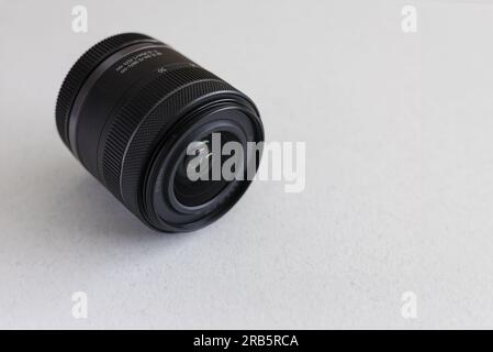 Camera lens on a white background. Close-up. View from above. Stock Photo