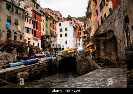 Borgo Storico di Riomaggiore or the old town and harbor of Riomaggiore, Cinque Terre, Italy. Stock Photo