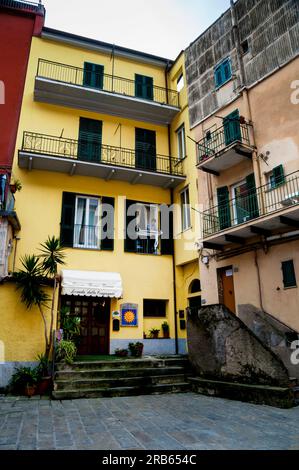 Tower houses and piazza in the fishing hamlet of Riomaggiore, Cinque Terre, Italy. Stock Photo