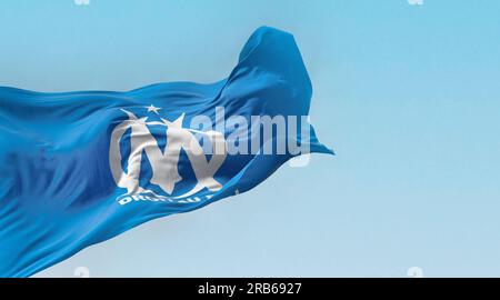 Marseille, FR, June 10 2023; Flag of Olimpique de Marseille football club waving on a clear day. French Ligue 1 Professional football team. Illustrati Stock Photo