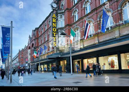 Dublin, Ireland - March 24, 2023:  Busy pedestrian only shopping area, Henry Street. Stock Photo