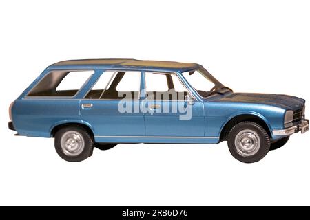 Image of an old, vintage blue station wagon scale model car isolated on white with a clipping path. Selective focus Stock Photo