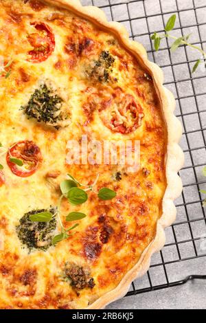 Delicious homemade quiche on table, top view Stock Photo