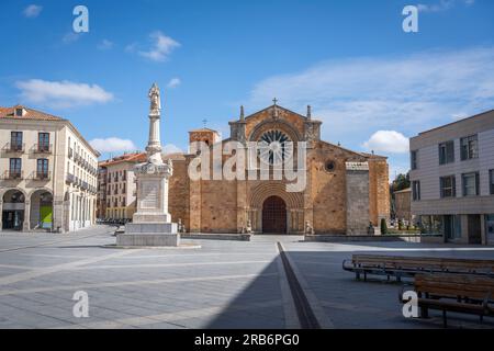 San Pedro Church at Plaza del Mercado Grande Square with Palomilla Monument - Avila, Spain Stock Photo