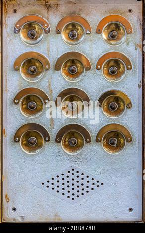 Beautiful vintage buttons bells in a residential building in Venice Stock Photo