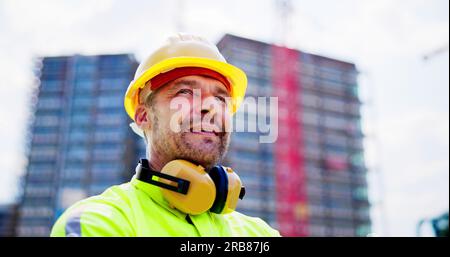 Industry Engineer With Hardhat. Industrial Workplace Safety Stock Photo